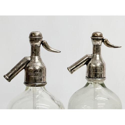 399C - A pair of vintage Grattan & Co LTD porcelain lined silver plated soda syphons. Belfast. 31cm