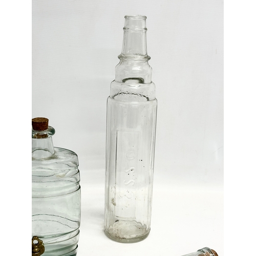 399D - A sundry lot. A large vintage glass Esso oil bottle 38cm. A Dunlop French Chalk and Rubber Solution.... 