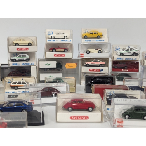 663 - A collection of vintage model cars by Wiking, Busch, Rietze Auto Modelle, etc