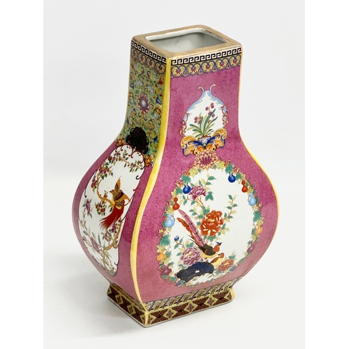 268 - A decorative Chinese enamelled pottery vase. 19x12x29cm