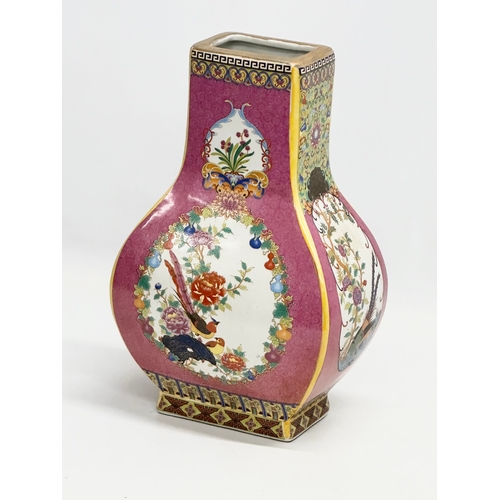 268 - A decorative Chinese enamelled pottery vase. 19x12x29cm