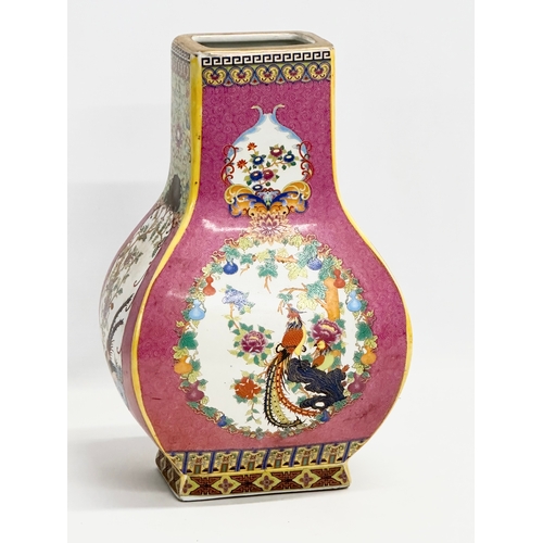 268 - A decorative Chinese enamelled pottery vase. 19x12x29cm