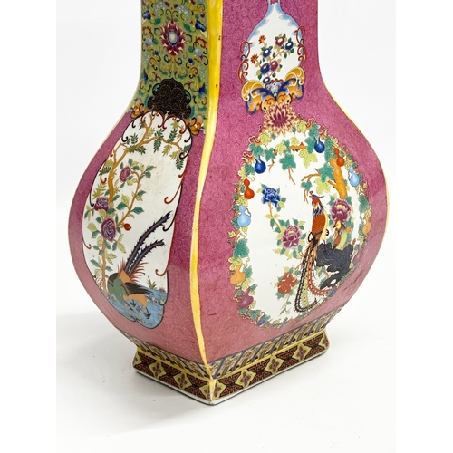 268 - A decorative Chinese enamelled pottery vase. 19x12x29cm