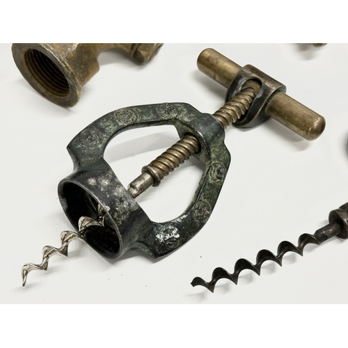 270 - A vintage Zodiac Rollover Corkscrew and 4 early 20th century brass taps