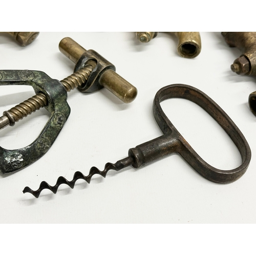 270 - A vintage Zodiac Rollover Corkscrew and 4 early 20th century brass taps