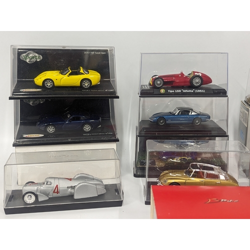 664 - A collection of model cars including Oxford Die-Cast, Vitesse, etc