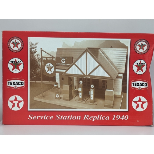 580 - Texaco Old Timer Collection. A Texaco Old Timer Collection Replica 1940 Service Station with box, in... 