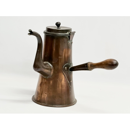 110 - An early/mid 19th century copper coffee pot. 21x33x29cm