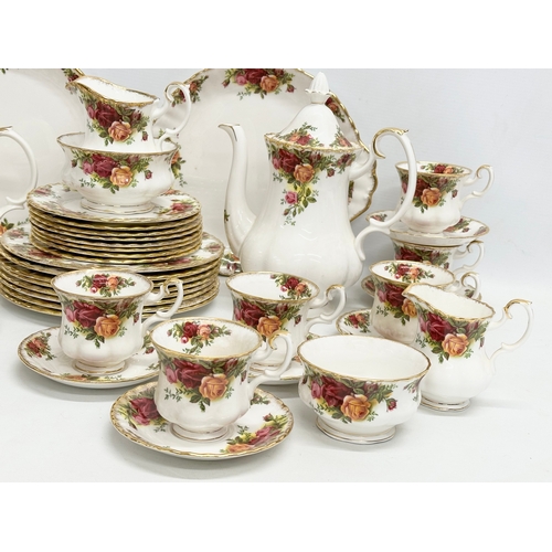 274 - A large 50 piece Royal Albert ‘Old Country Roses’ tea and coffee service. 8 salad plates, 21cm. 8 sa... 