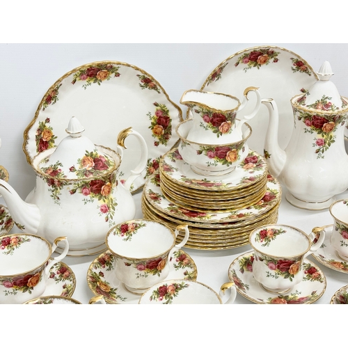 274 - A large 50 piece Royal Albert ‘Old Country Roses’ tea and coffee service. 8 salad plates, 21cm. 8 sa... 