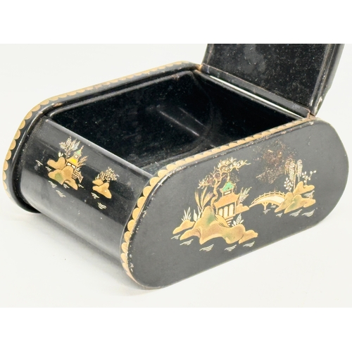 275 - An early 20th century Japanese style hand painted lacquered cigarette box. 12x9x5.5cm