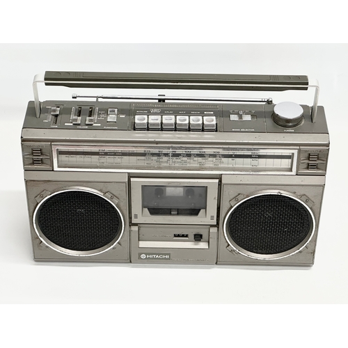 669 - A vintage Hitachi stereo cassette recorder. Model TRK-7100E.