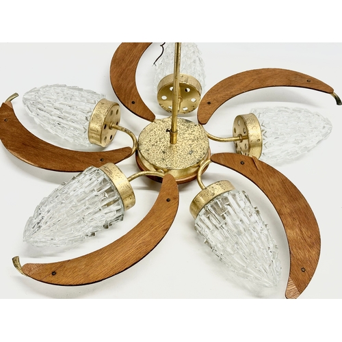 190D - A large 1960’s Mid Century teak and brass ceiling light fitting with 5 glass shades. 69x38cm