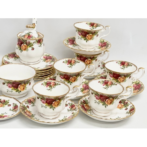 275B - A 25 piece 1962 Royal Albert ‘Old Country Roses’ tea set. Rose vase 19cm. A sugar jar with lid and s... 