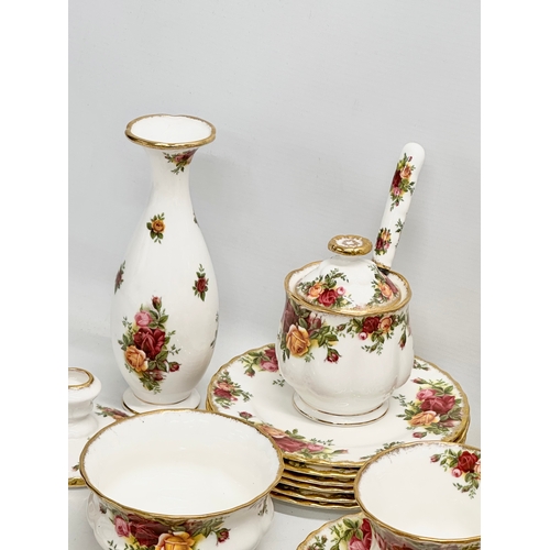 275B - A 25 piece 1962 Royal Albert ‘Old Country Roses’ tea set. Rose vase 19cm. A sugar jar with lid and s... 