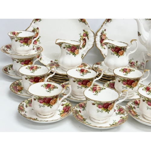 275C - A 47 piece Royal Albert ‘Old Country Roses’ tea service. 2 pairs of salt and pepper shakers. A teapo... 