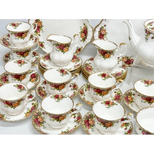 275C - A 47 piece Royal Albert ‘Old Country Roses’ tea service. 2 pairs of salt and pepper shakers. A teapo... 