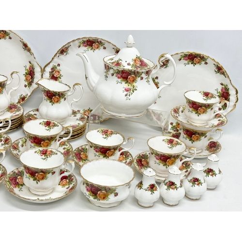 275C - A 47 piece Royal Albert ‘Old Country Roses’ tea service. 2 pairs of salt and pepper shakers. A teapo... 