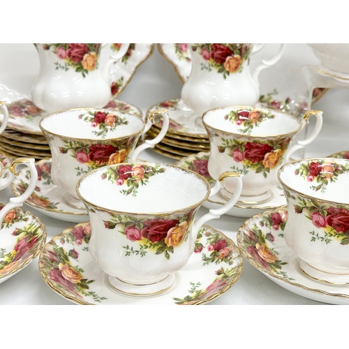 275C - A 47 piece Royal Albert ‘Old Country Roses’ tea service. 2 pairs of salt and pepper shakers. A teapo... 