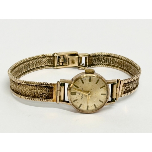 493 - A vintage 9ct gold Walker & Hall watch. 17.93 grams.