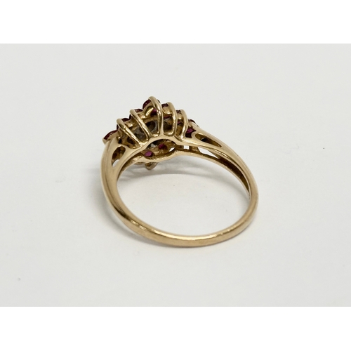 494 - A 9ct gold and diamond ring with case. Size O.