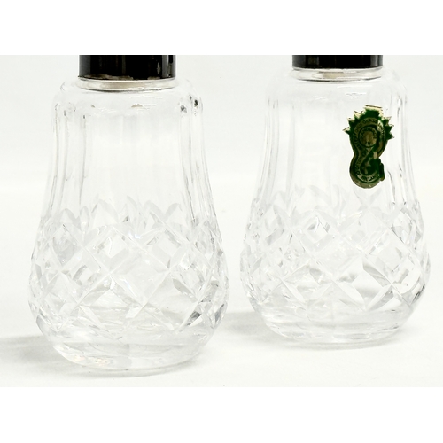 258 - A pair of Waterford Crystal ‘Lismore’ salt and pepper shakers. 10.5cm