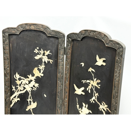 259 - An early 20th century Japanese carved framed 2 tier screen with bone lotus leaves and birds in fligh... 