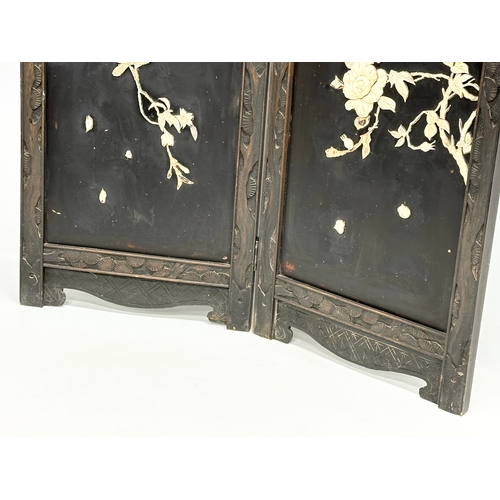 259 - An early 20th century Japanese carved framed 2 tier screen with bone lotus leaves and birds in fligh... 