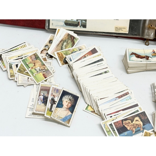 529 - A collection of vintage cigarette cards and British Military themed Classic One Cover Album.