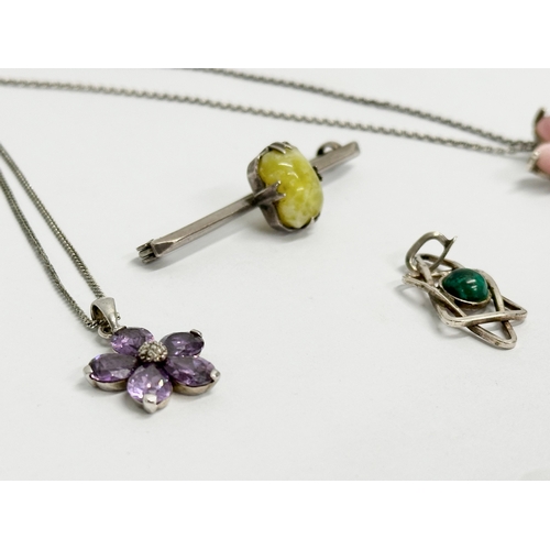 517 - A collection of silver jewellery with Amethyst stone and others.