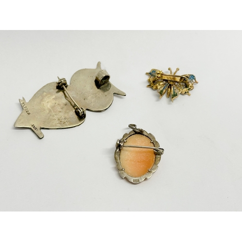 518 - A sunset lot of silver. A Mexican silver & Mother of Pearl brooch, stamped Alpaca. A silver and enam... 