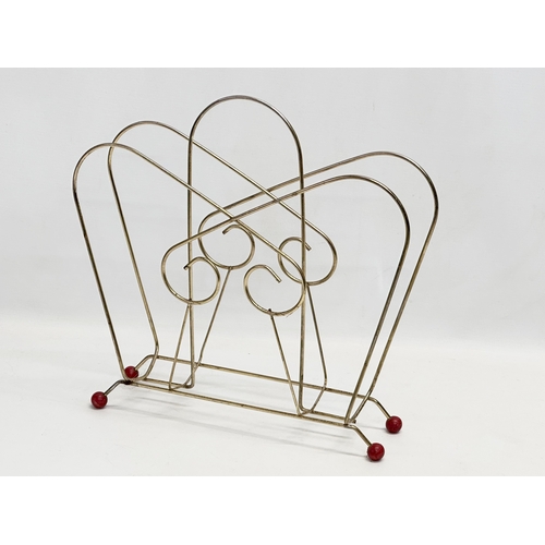 200G - A 1960’s Mid Century brass magazine rack and a Mid Century Soulet print.