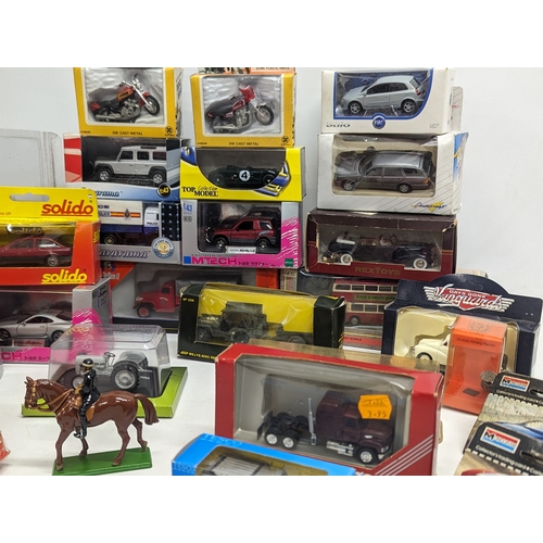 689 - A collection of model cars including Solido, Vanguards, Cararama, etc