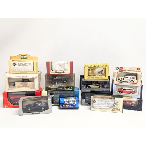 705 - A collection of model cars and trucks including Corgi, Lledo, Oxford Die-Cast, Minichamps, etc