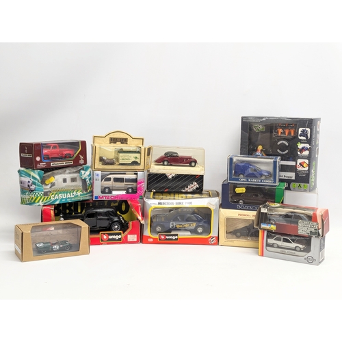 710 - A collection of model cars including Burago, Solido, Days Gone, Eligor, etc.