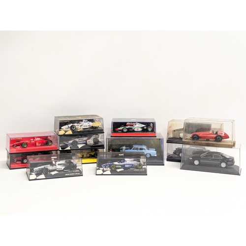 711 - A collection of model cars, including Minichamps, Brumm, etc.