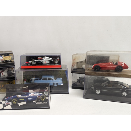 711 - A collection of model cars, including Minichamps, Brumm, etc.