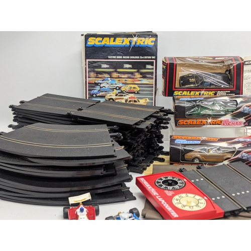 582 - A collection of vintage Scalextric, including Power Unit, 2 remote controls, 3 boxed cars and 2 othe... 