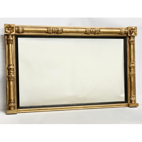 153B - A large William IV early 19th century gilt framed over-mantle mirror. 1830. 108x7x79cm