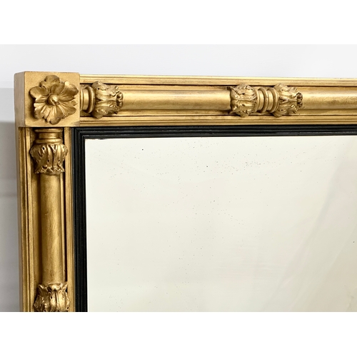153B - A large William IV early 19th century gilt framed over-mantle mirror. 1830. 108x7x79cm