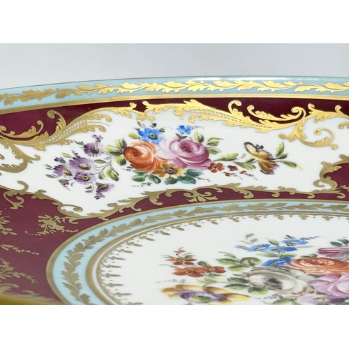 275E - A large Atelier Camille Le Tallec porcelain charger bowl. Hand painted classical style gilding with ... 