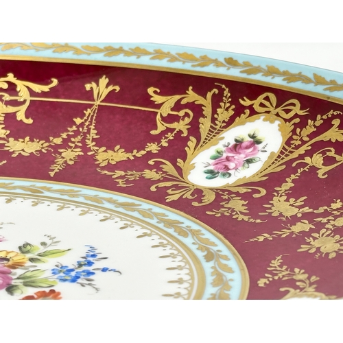 275E - A large Atelier Camille Le Tallec porcelain charger bowl. Hand painted classical style gilding with ... 