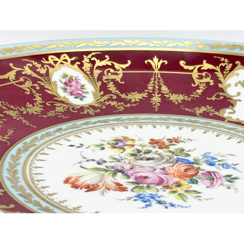 275E - A large Atelier Camille Le Tallec porcelain charger bowl. Hand painted classical style gilding with ... 