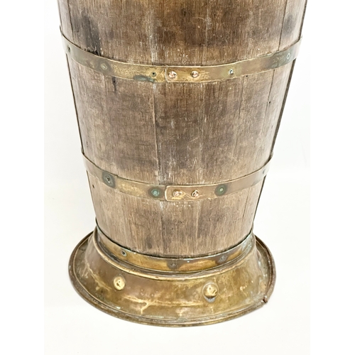 153E - A large late 19th century French oak brass bound Grape Hod/stickstand. 30x65cm