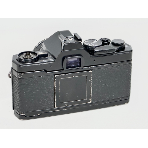 761 - A vintage Olympus OM-2 camera.