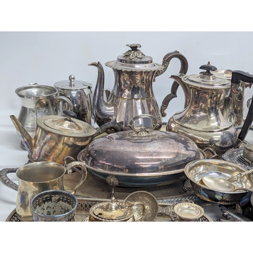 399E - A quantity of silver plate and E.P.N.S., including trays, tea and coffee pots, etc.