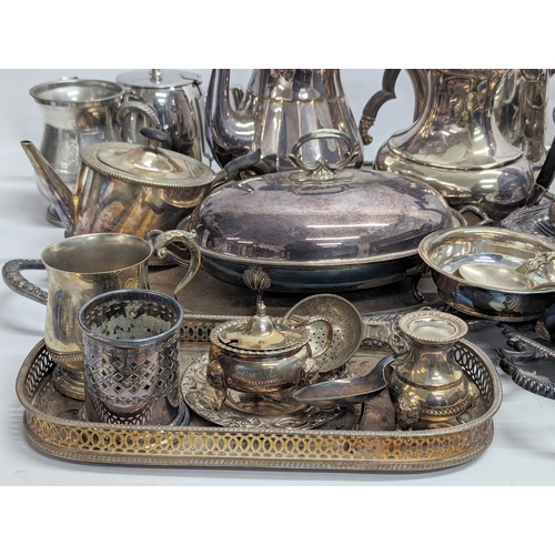 399E - A quantity of silver plate and E.P.N.S., including trays, tea and coffee pots, etc.