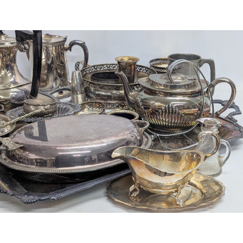 399E - A quantity of silver plate and E.P.N.S., including trays, tea and coffee pots, etc.