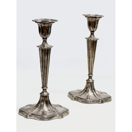 488 - A pair of large sterling silver Hawksworth, Eyre & Co Ltd candlesticks. Early 20th century, 1901. 16... 