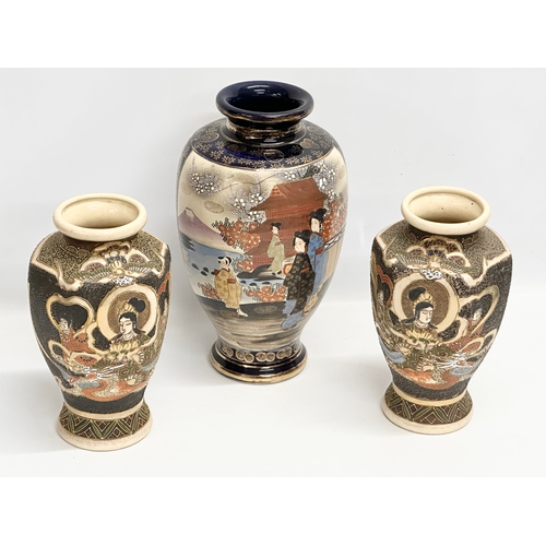 175C - 3 early 20th century Japanese Satsuma pottery vases. Pair measures 15x25cm. Largest 19x32.5cm